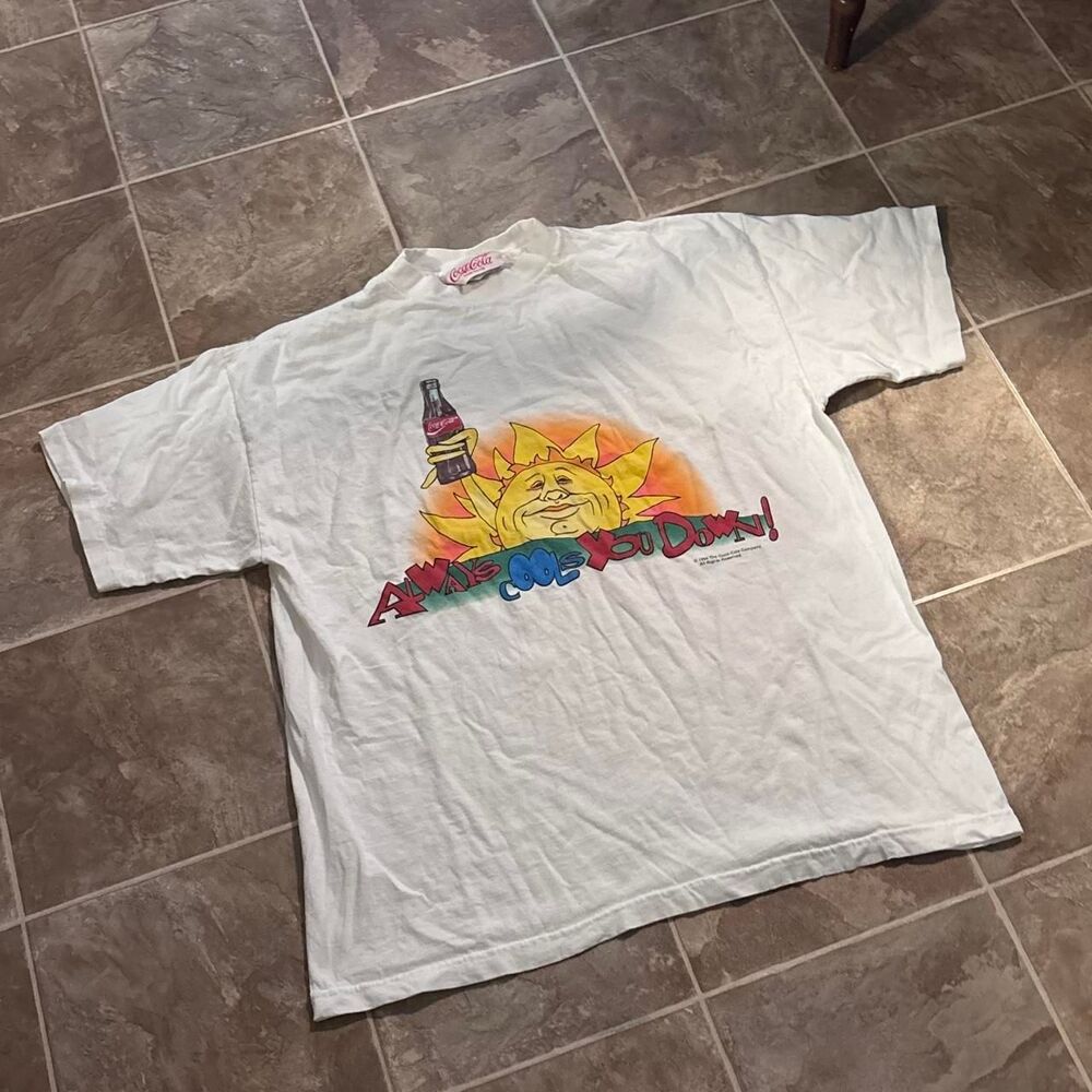 Vtg 1994 Coca-Cola graphic tee w/ a smiling sun with "Always Cool Down" SZ XL